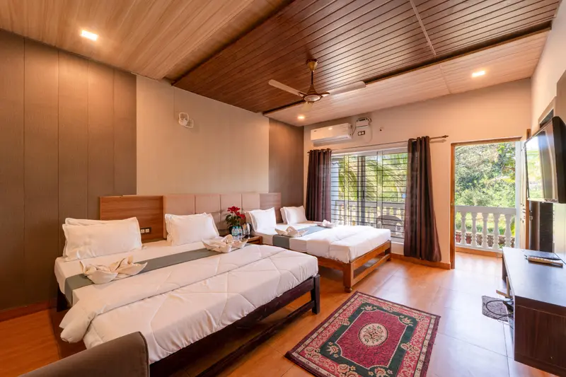Triple sharing room with three beds